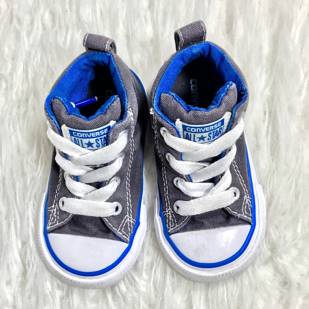 Royal Blue lined All Star Converse Shoes.